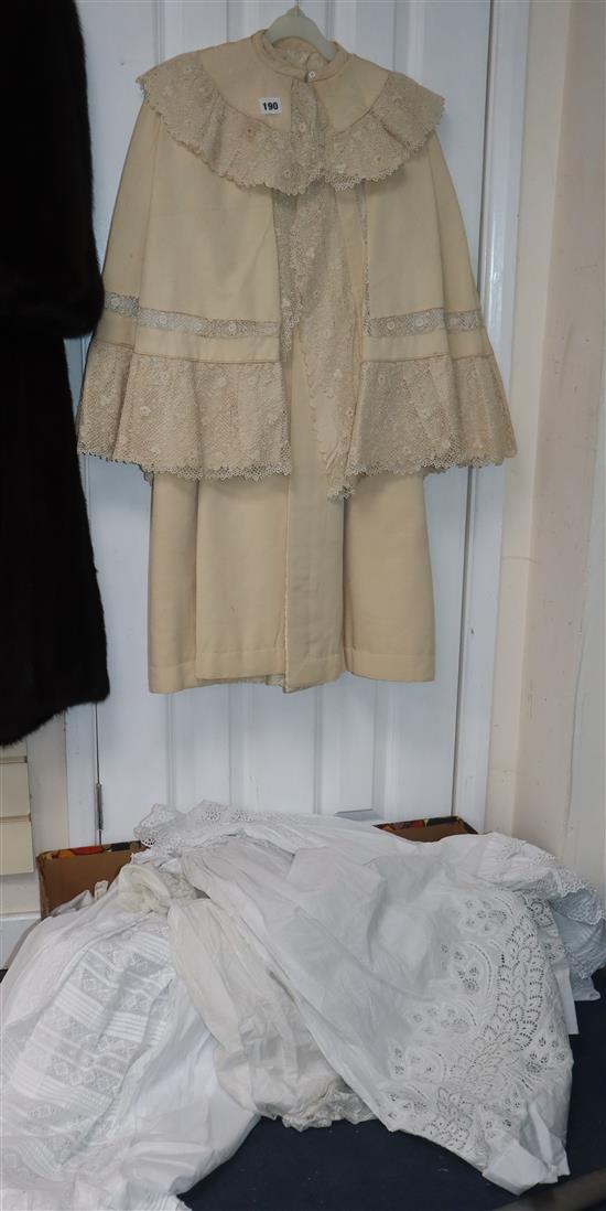 A Victorian silk babys christening cape edged with Irish crochet lace, another cape and six christening gowns etc